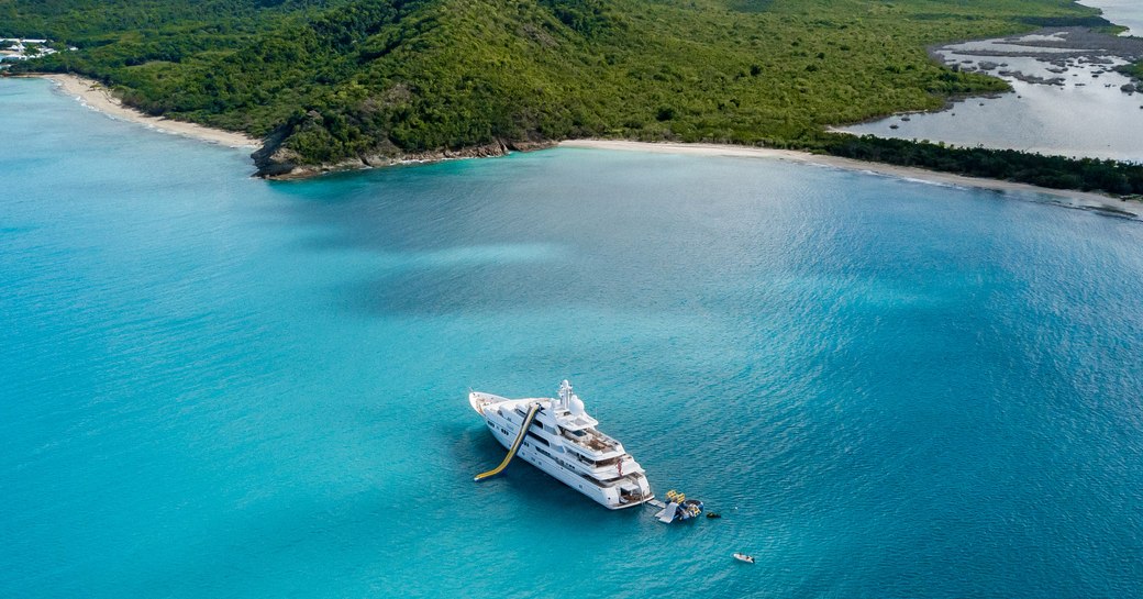 Aerial shot of luxury yacht TITANIA from Lurssen in the waters surrounding the Maldives