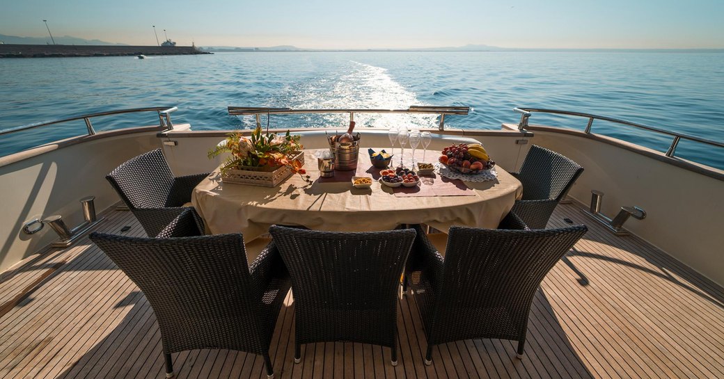 Alfresco dining on aft deck of superyacht JURIK