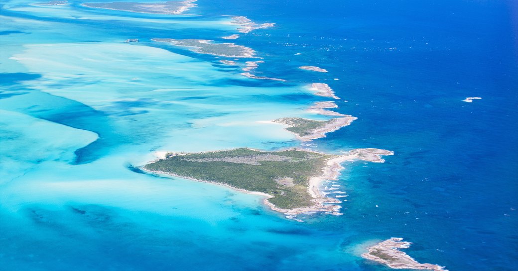 Aerial view looking down on an archipelago of Bahamian islands