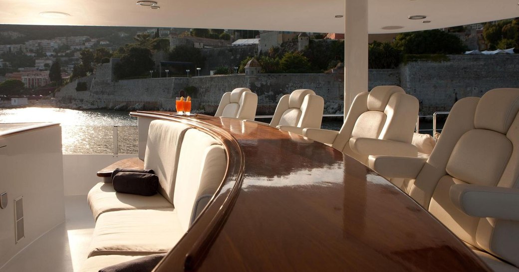 Sundeck wet bar and seating on luxury yacht AZZURRA II