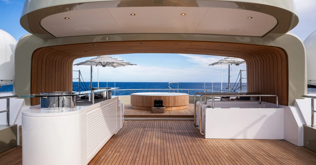 Overview of the sundeck onboard charter yacht LADY A with a deck Jacuzzi aft