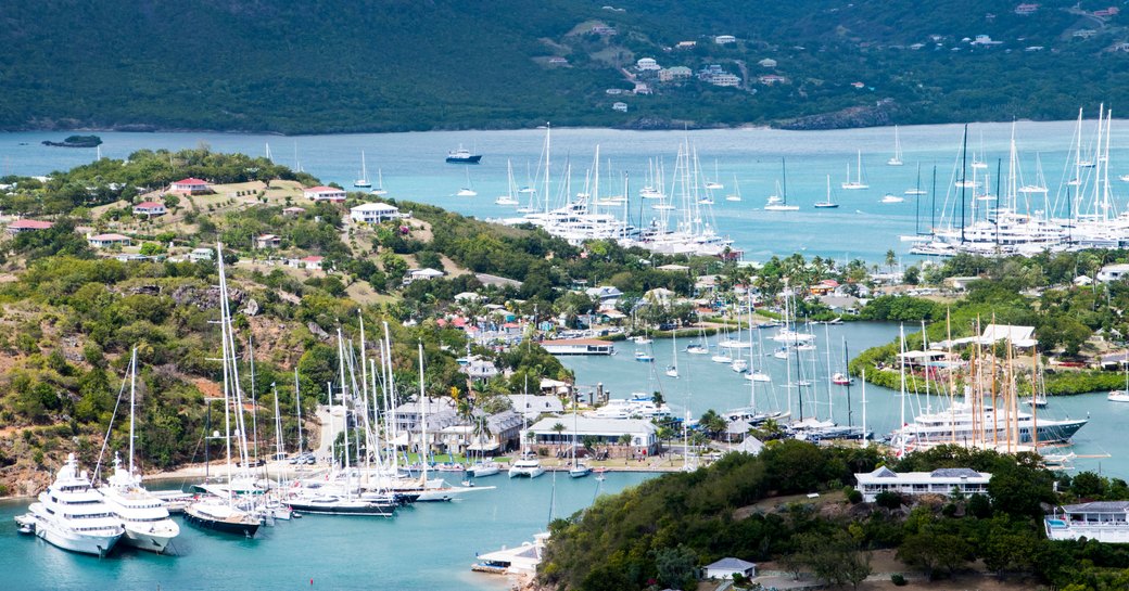 Overview of Nelson's Dockyard with many sailing yacht charters berthed