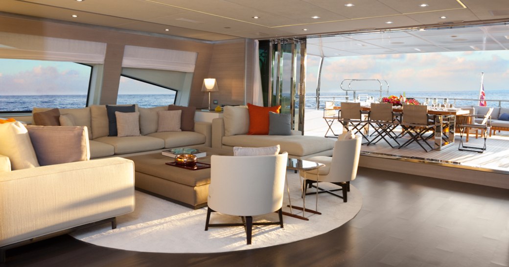 tranquil skylounge opens up onto alfresco dining area on board motor yacht Cheers 46 