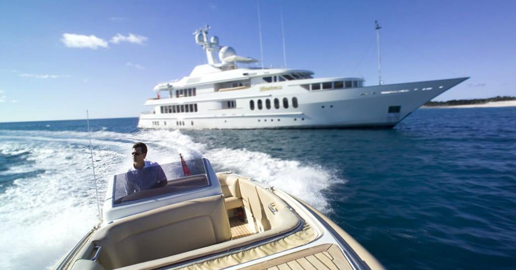 superyacht ‘Huntress II’ anchors as tender takes to the water on a Caribbean Holiday charter