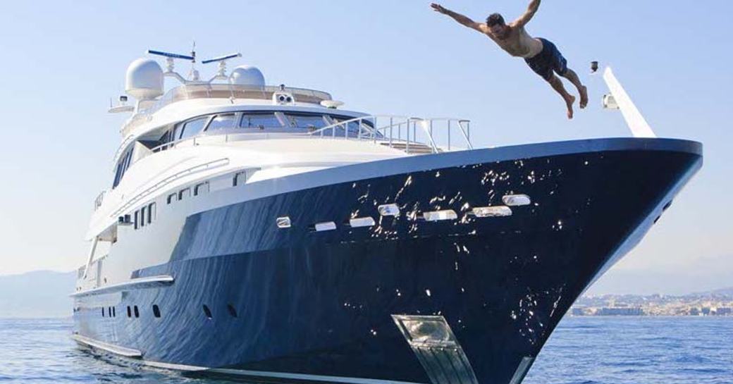 charter guest jumps from the bow of daloli yacht