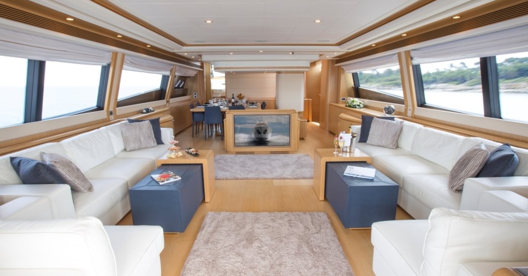 sofas and armchairs in the main salon of superyacht Porthos Sans Abri 