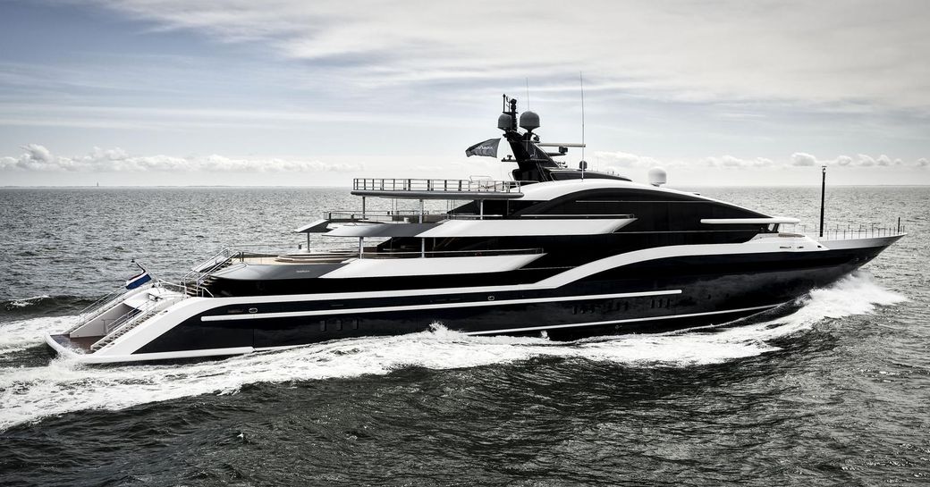 motor yacht DAR cuts through the water while undertaking sea trials 