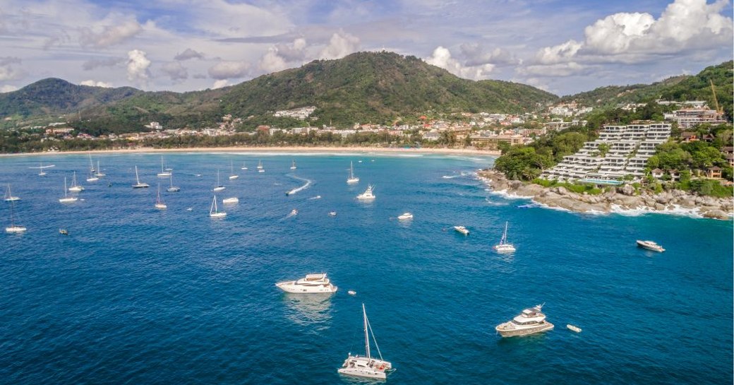 yachts gather in waters off Kata Rocks for the KRSR