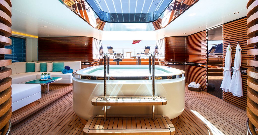 Indoor jacuzzi in beach club of sailing yacht AQUIJO