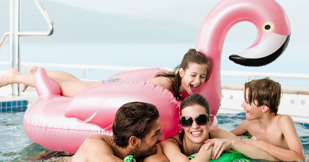 fun in the pool onboard family yacht rental