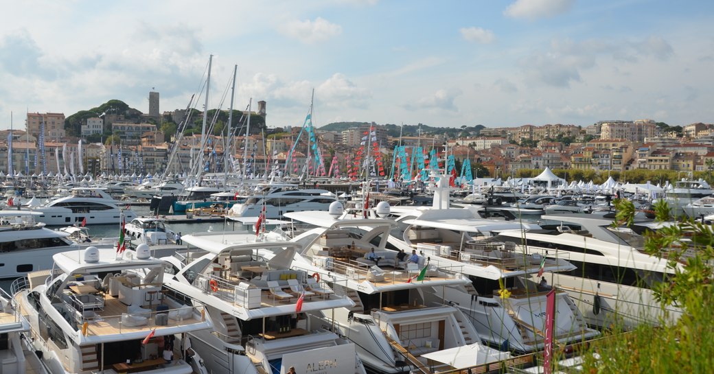 Yachts lined up in the harbour at Cannes Yachting Festival