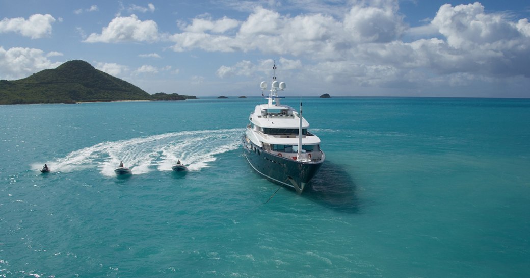 The newly renamed 'Ice Angel' underway with three jetskis.