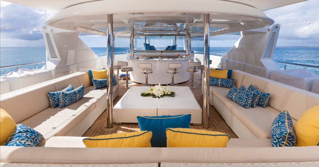 TRENDING superyacht sundeck, with wet bar and lounge area