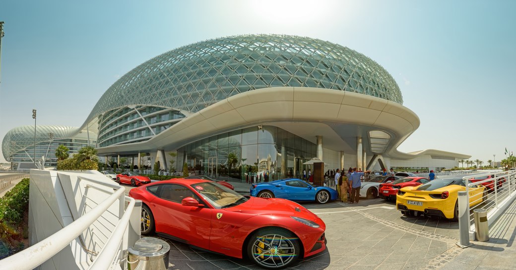 Fast cars parked outside the Yas Marina Hotel in Dubai