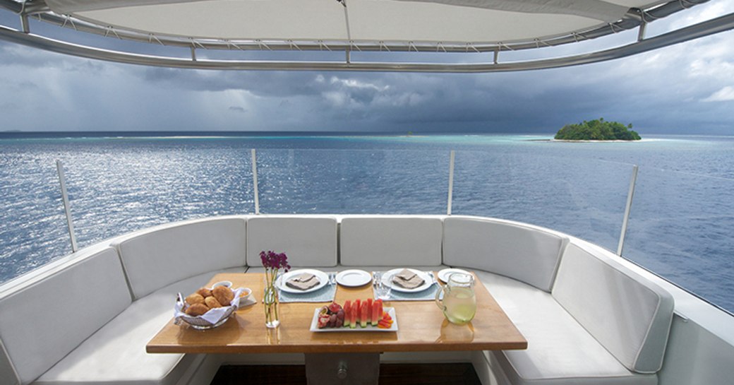 breakfast is served in casual alfresco dining area on board luxury yacht SENSES