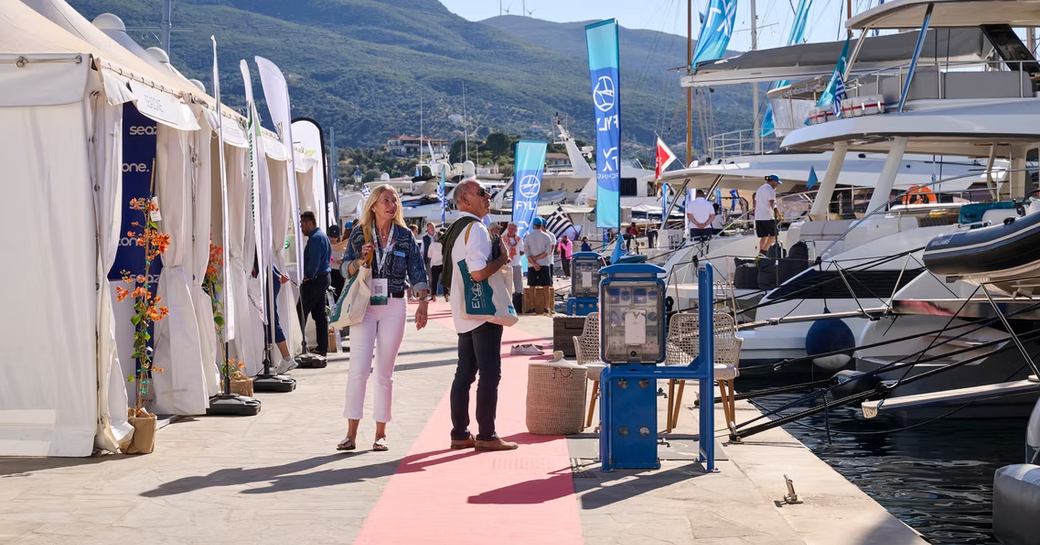 EMMYS show with red carpet and visitors viewing motor yacht charters