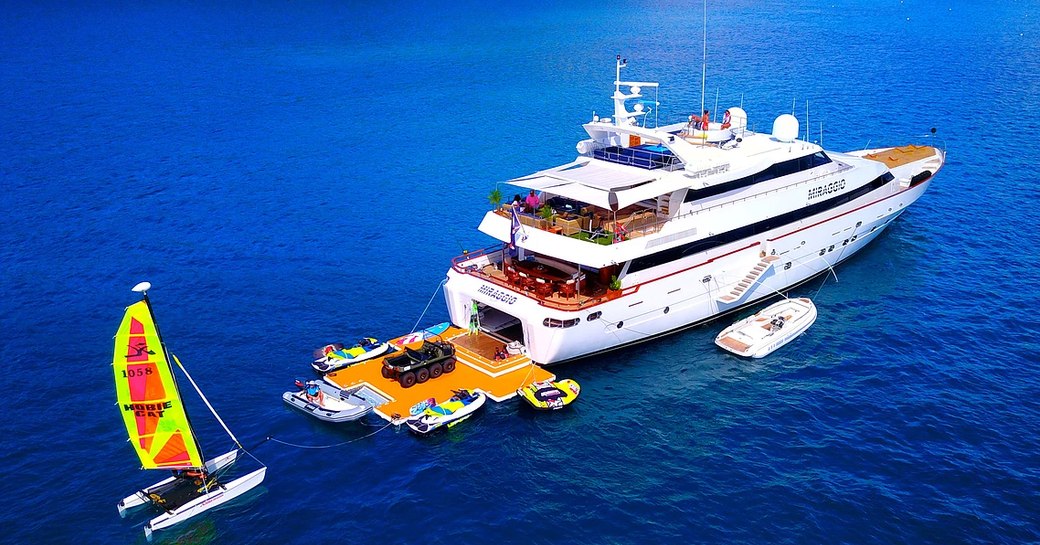 Profile shot of superyacht MIRAGGIO at sea with her toys and tenders