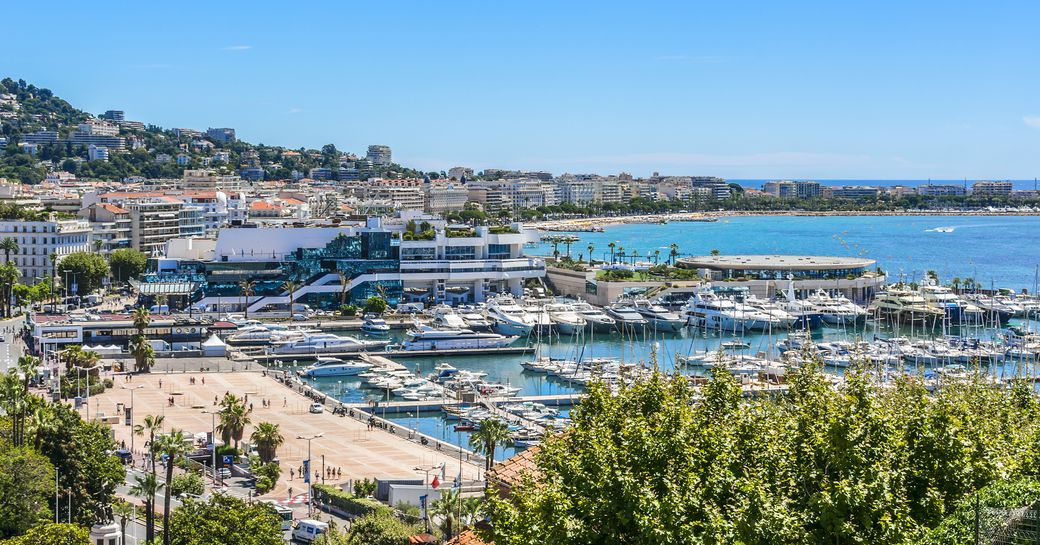Overview of Vieux Port in Cannes with motor yacht charters berthed