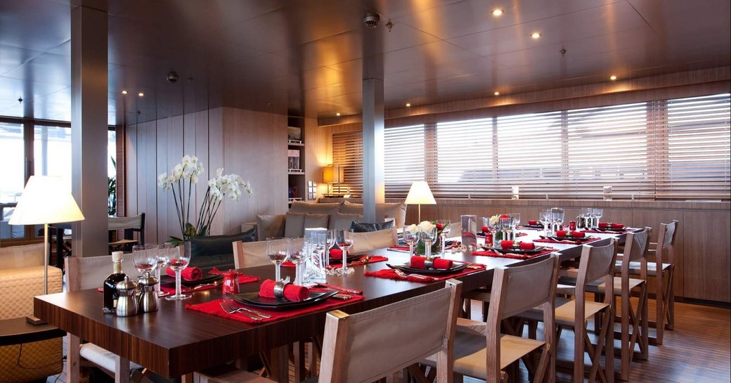 long, rectangular dining table on board motor yacht MARIU 