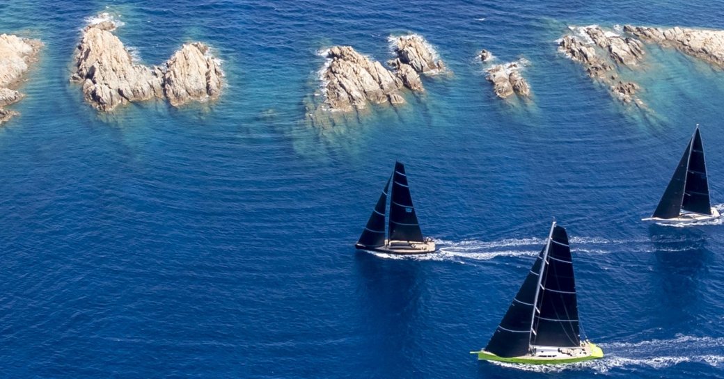 Aerial view of sailing yachts on the water at Loro Piana Superyacht Regatta