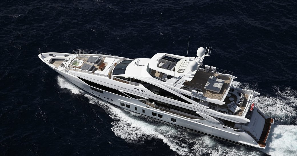 Luxury yacht WILLOW cruising from an aerial perspective