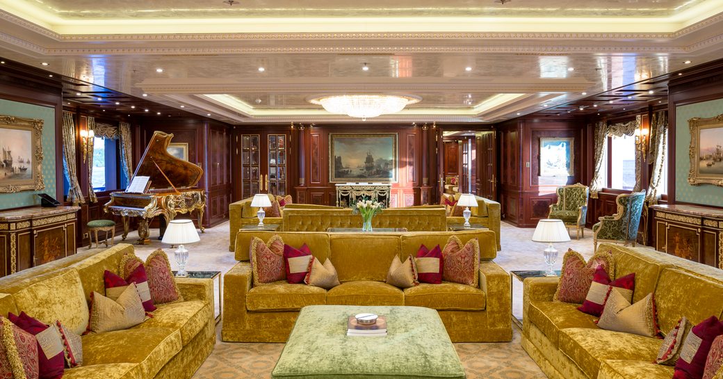Main salon with plush sofas onboard charter yacht BLACK PEARL