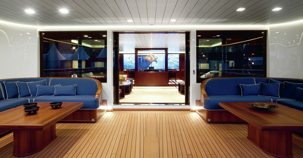 main salon and outdoor seating area of luxury yacht galileo g