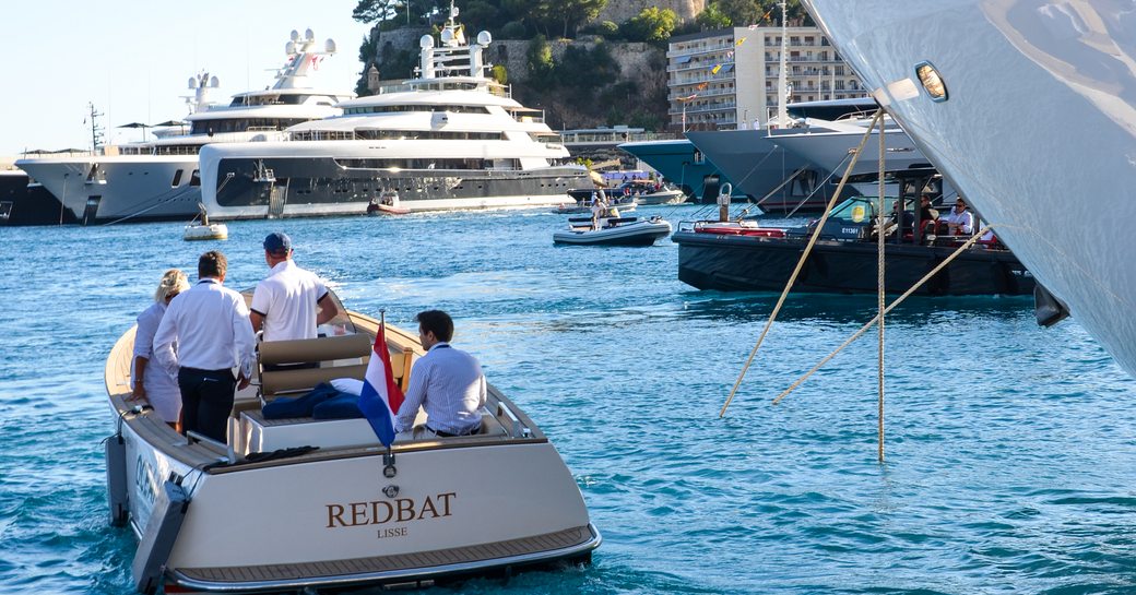 tender floats alongside superyacht at monaco yacht show