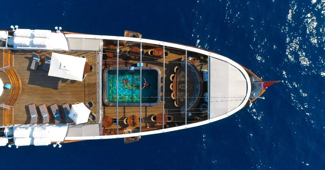 aerial shot of superyacht Christina O's classic and vintage custom mosaic pool 