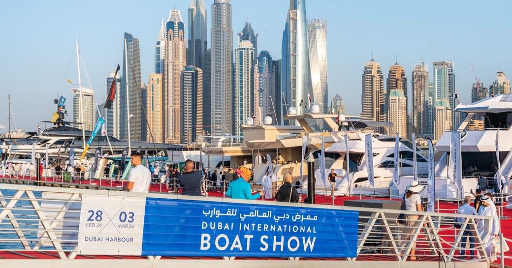 Dubai Harbour marina entrance with motor yacht charters aft