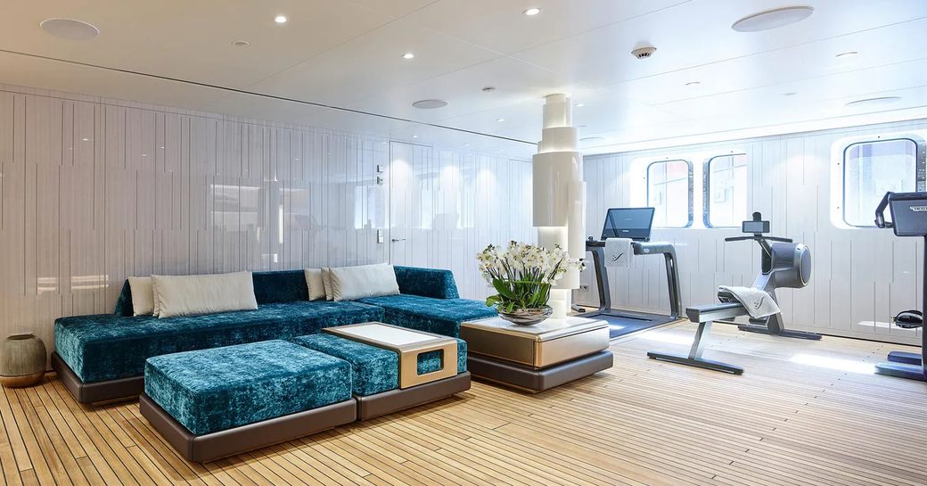 beach club on superyacht soaring with gym equipment