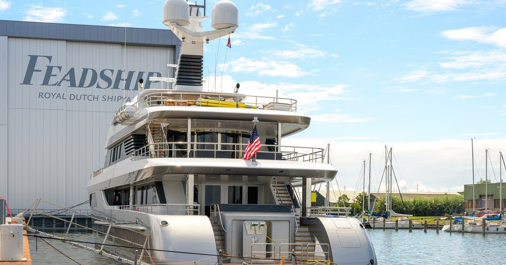 Luxury megayacht W aft deck view as she sits outside Feadship facilities 