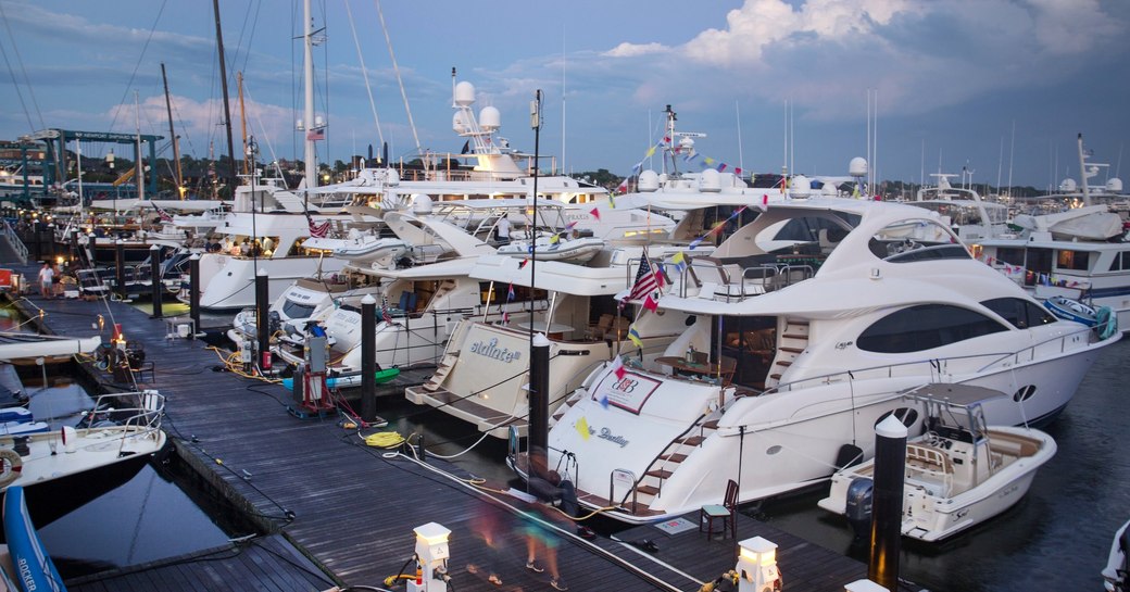 luxury yachts lined up for Newport Charter Yacht Show 