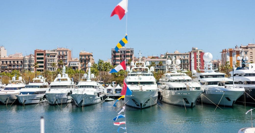 yachts lined up in OneOcean Port Vell in Barcelona for the MYBA Charter Show