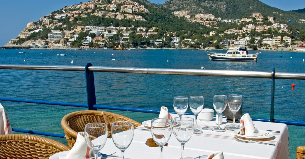 Alfresco dining table with views over the coastline of Mallorca