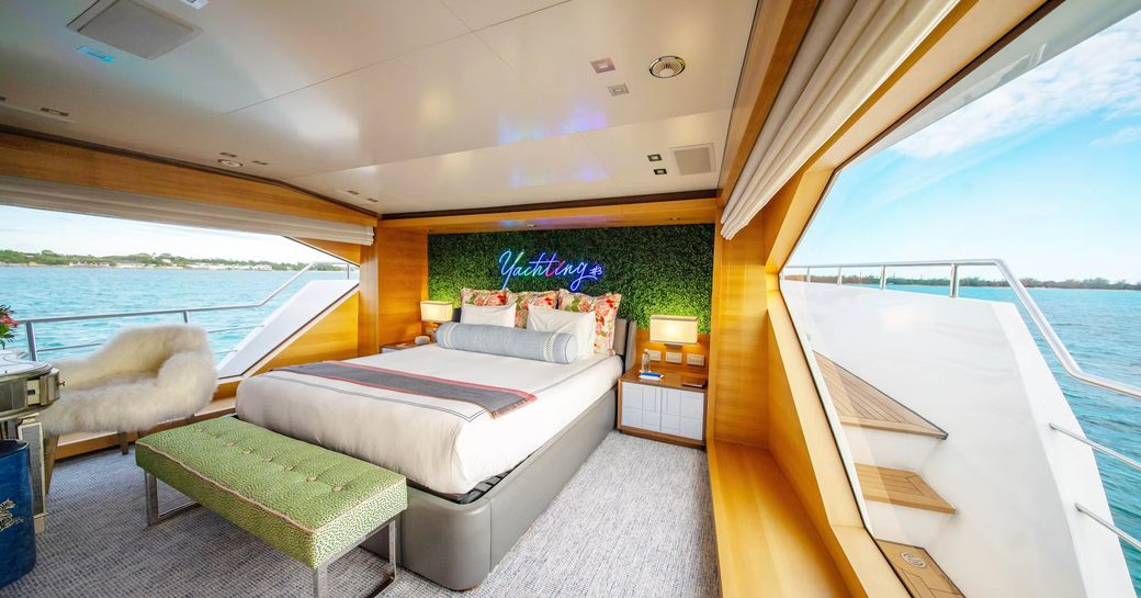 Master cabin with central berth onboard luxury yacht charter REHAB