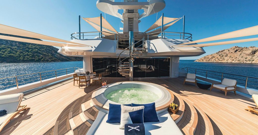 Deck Jacuzzi and seating onboard charter yacht PROJECT X