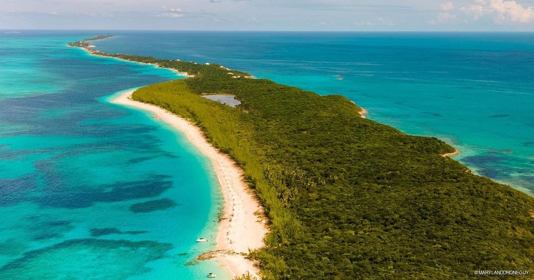 Drone shot capturing Rose Island surrounded by water