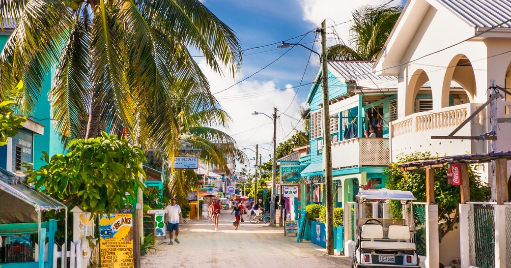 Bright and colourful town road in sunny and tropical yacht charter destination Belize 