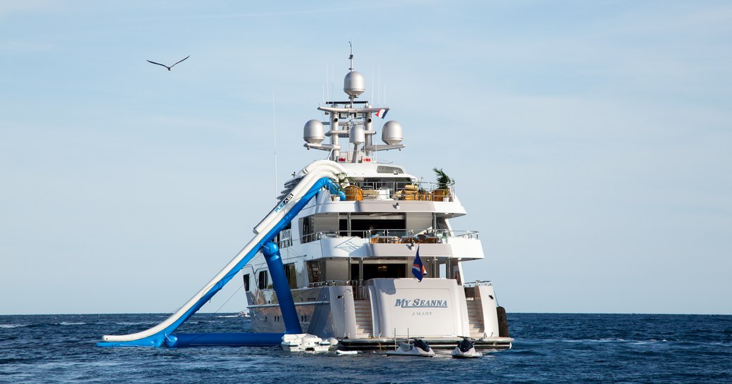 view of aft of motor yacht My Seanna with water toys and water slide