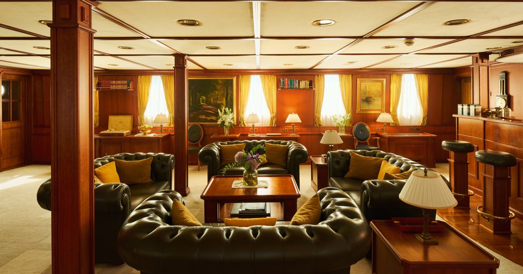 Lounge onboard charter yacht SEAGULL II with leather armchairs