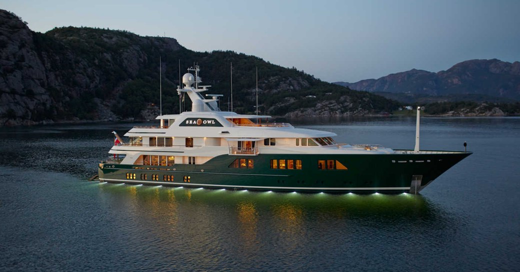 Superyacht charter SEA OWL at anchor at dusk