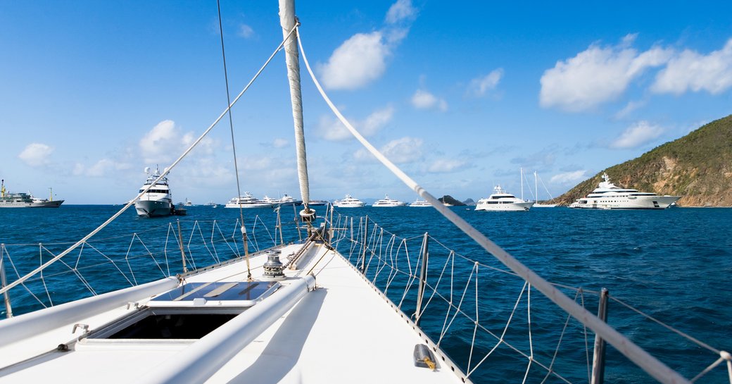 View of a superyacht bow around the coastline of St Barts