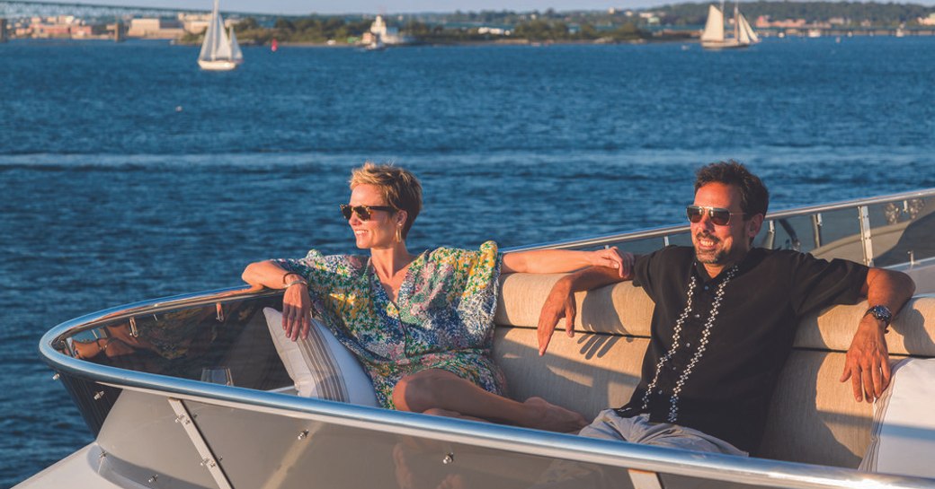 charter guest lounge on the sundeck looking out to sea on board luxury yacht Far From It 