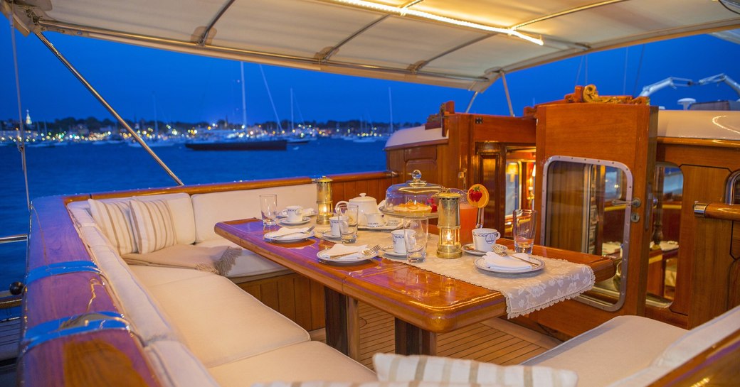 Cockpit with alfresco dining setup on board sailing yacht Gloria