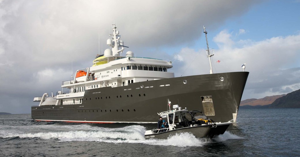 yersin explorer yacht with tender alongside