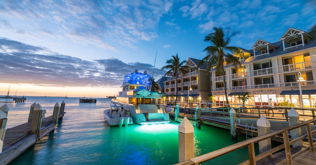 Superyacht with underwater lights in Florida Keys marina