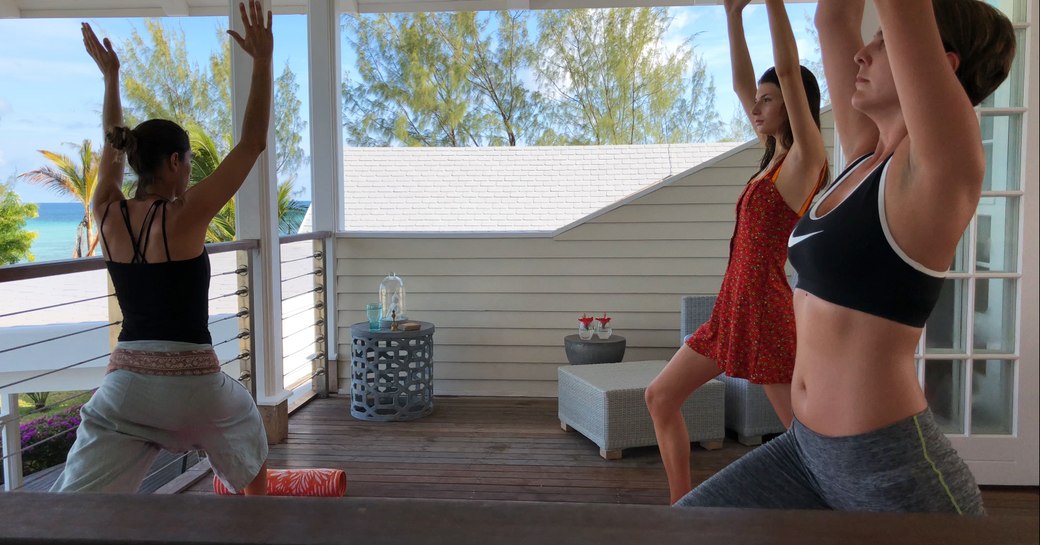 Guests enjoying relaxing yoga session at Thanda island resort