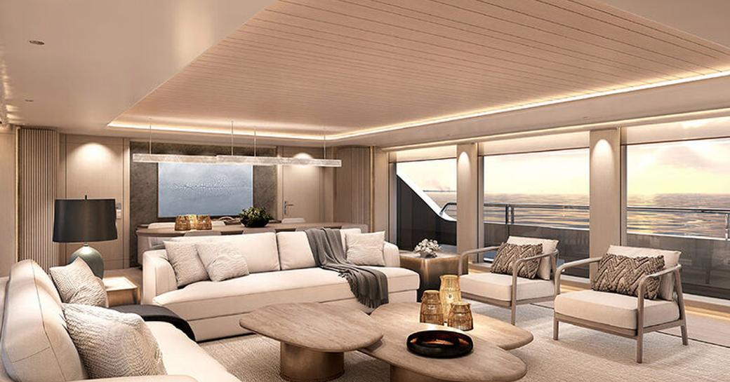 Main salon lounge with cream seating and large windows onboard charter yacht MEMORIES