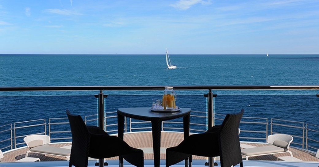 coffee table overlooking the water on naia